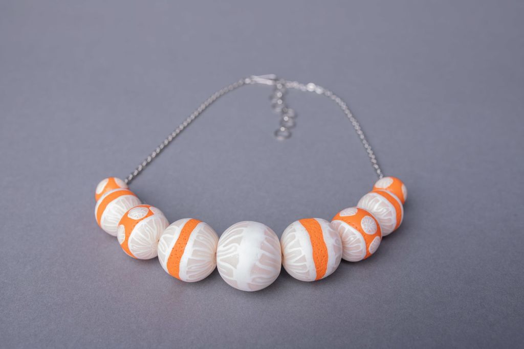 Polymer clay necklace assembled with metal fittings